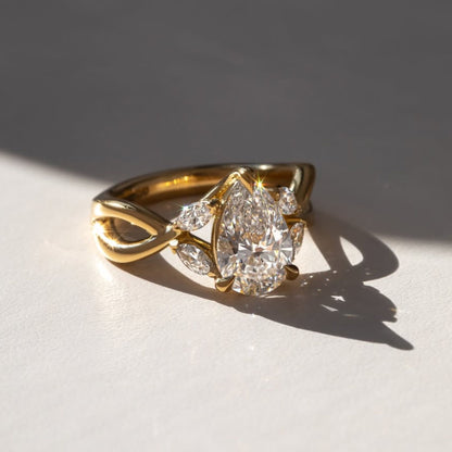 4.1 CT Pear Cut Engagement Ring, Infinity Twist Gold Ring