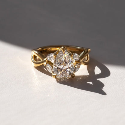 4.1 CT Pear Cut Engagement Ring, Infinity Twist Gold Ring